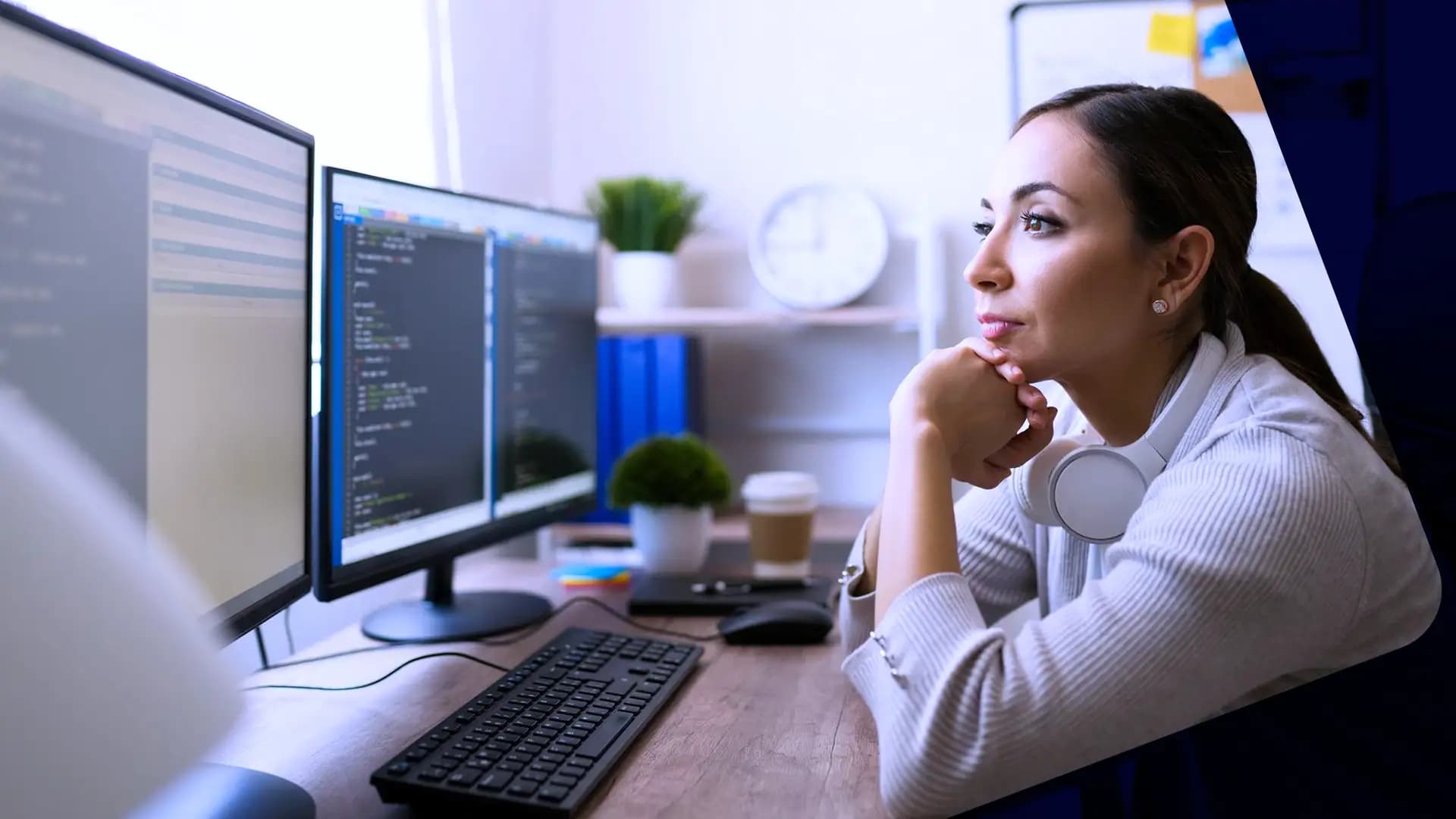 Medium Aged IT Analist watching screens